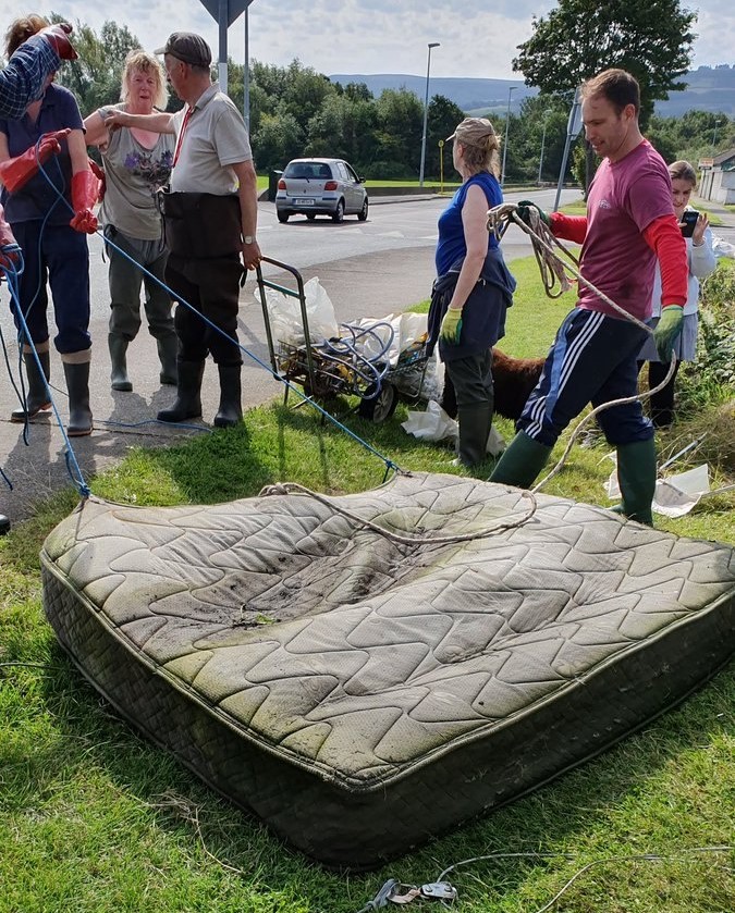 a waterlogged mattress that was pulled from the river